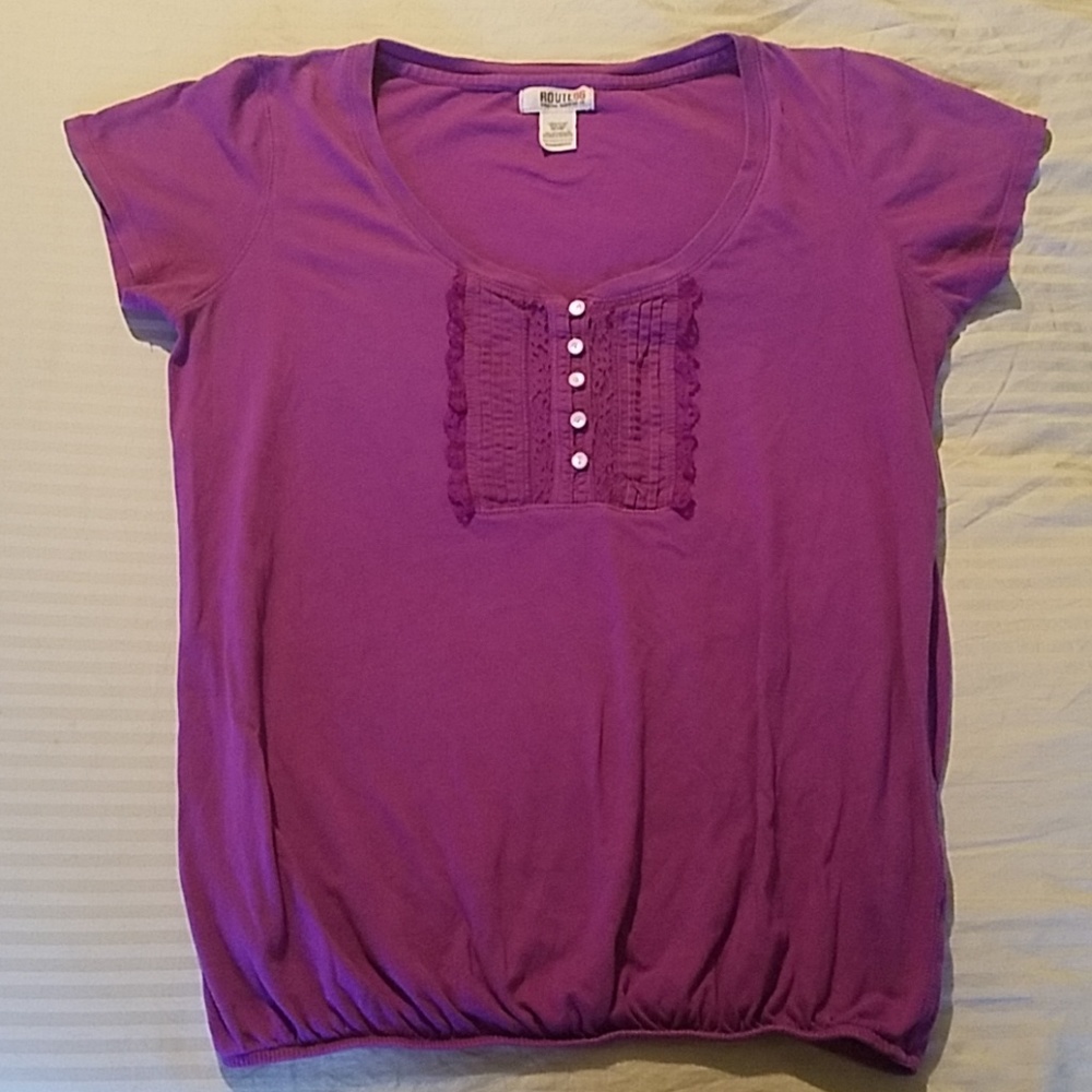 Purple elastic waist t-shirt with lace detail.